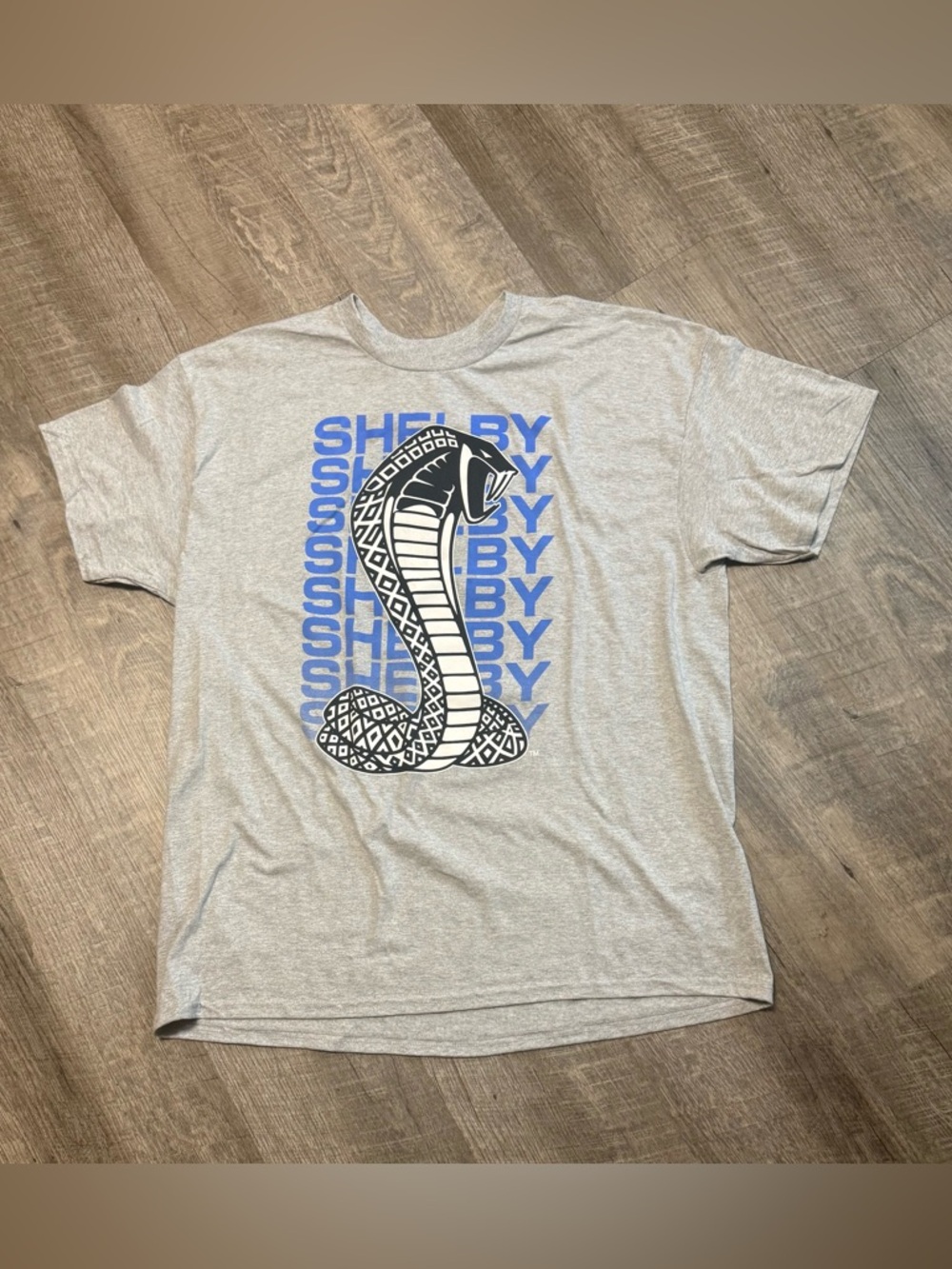 Selby Cobra Gray Tee with Blue Graphic Accents